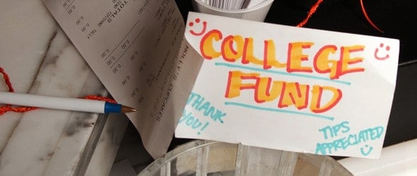 A word "college fund" written on a white paper