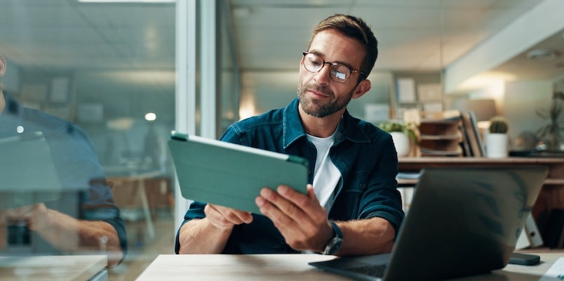 Professional researching passive income opportunities and tax implications.