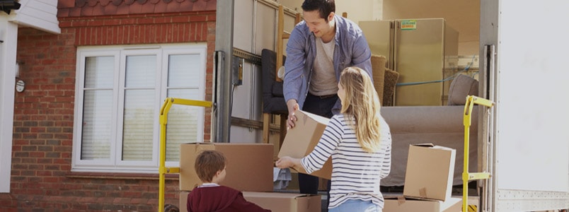 Children helping a movers and packers man