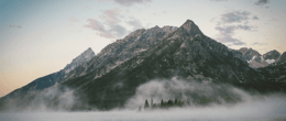 A foggy mountain peak