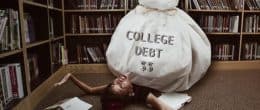 Illustration of a student crushed by college debt