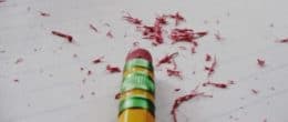A close up of a pencil eraser correcting a mistake