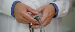 Stethoscope in doctors hand
