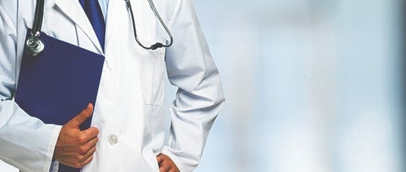 Cropped shot of a male doctor holding a file containing medical reports