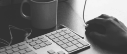 A person using a keybord & mouse