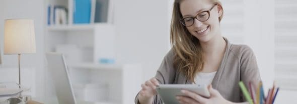 what-to-know-self-employed-taxes-Blog Young lady reviewing her self-employment taxes.